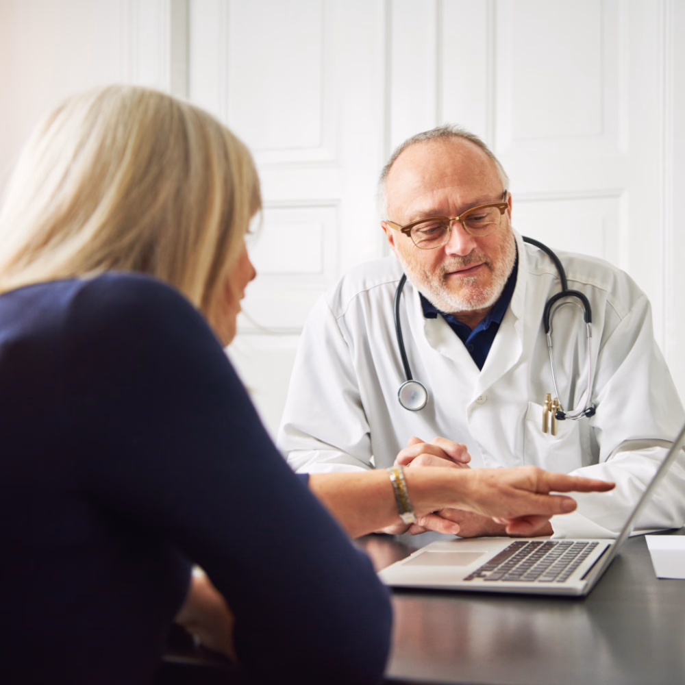Doctor reviewing medical results with a patient during a consultation